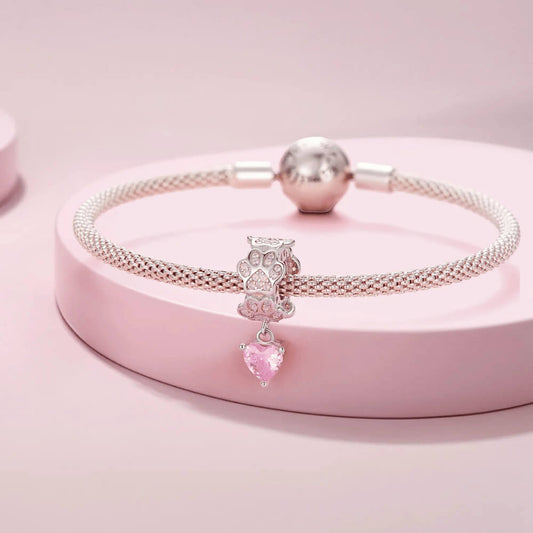 Sterling silver paw-print charm with opal stones and pink heart dangle