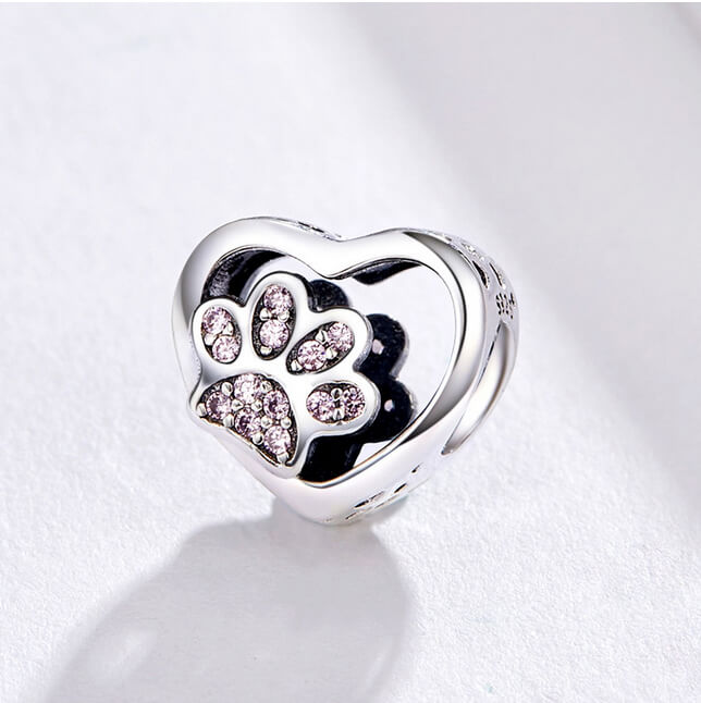 Sterling silver heart charm with pink crystal paw print center