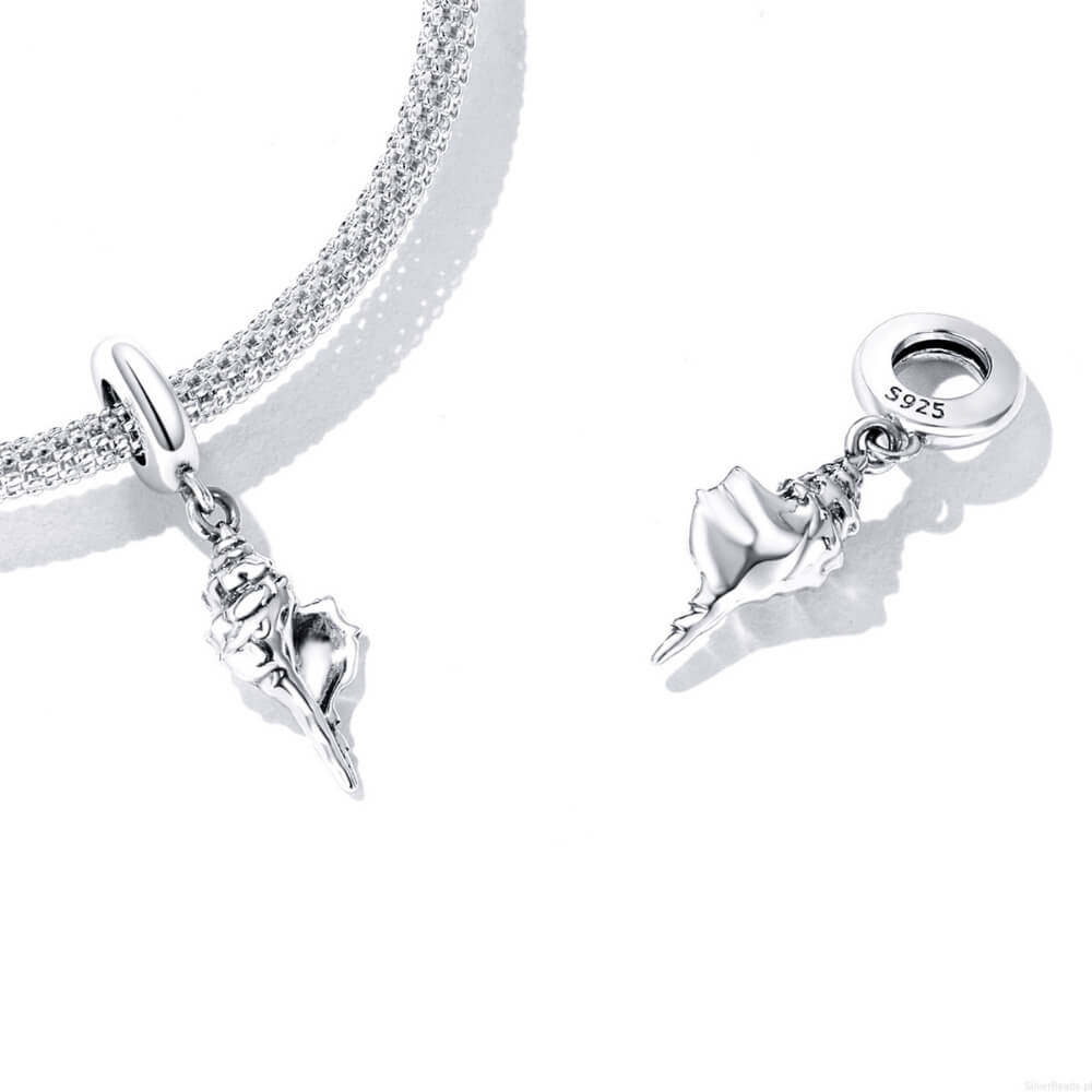 Sterling silver seashell dangle charm featuring a detailed conch shell design and smooth polished bail