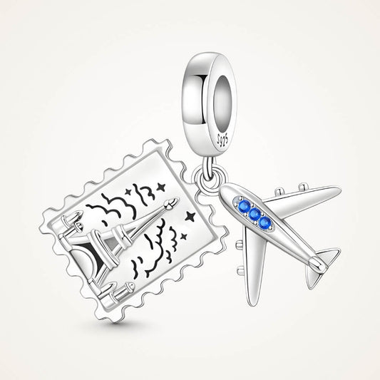 Sterling silver airplane and postcard charm with blue crystal accents - ORÉYA