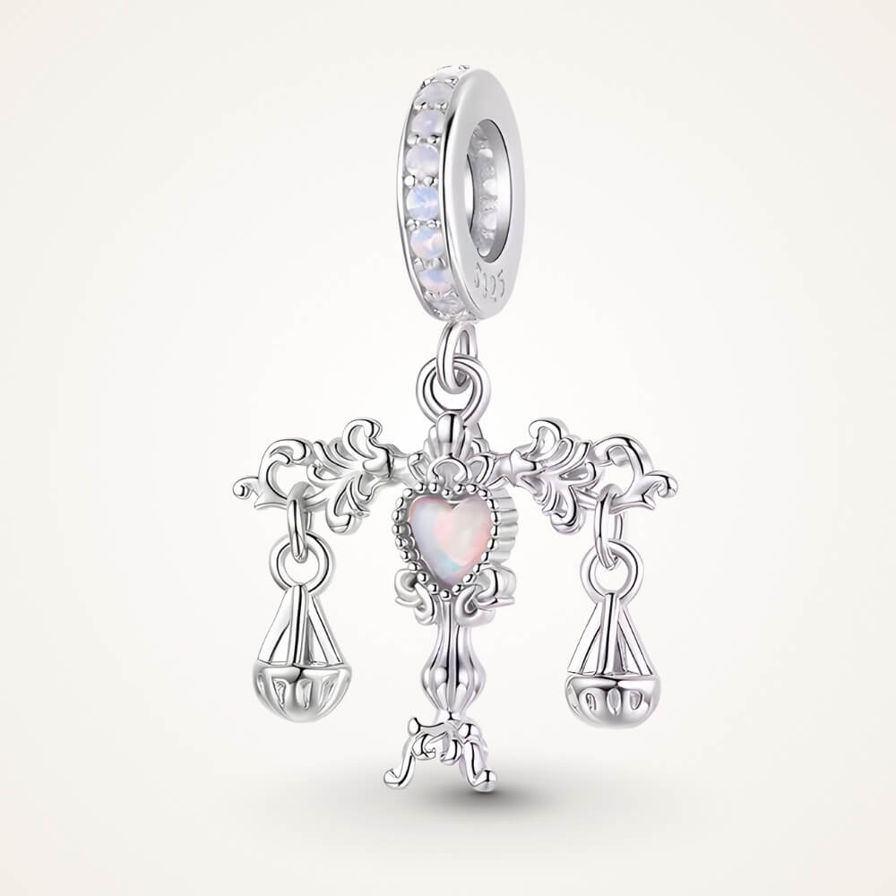 Sterling silver balance charm with opal heart center and hanging scales - ORÉYA