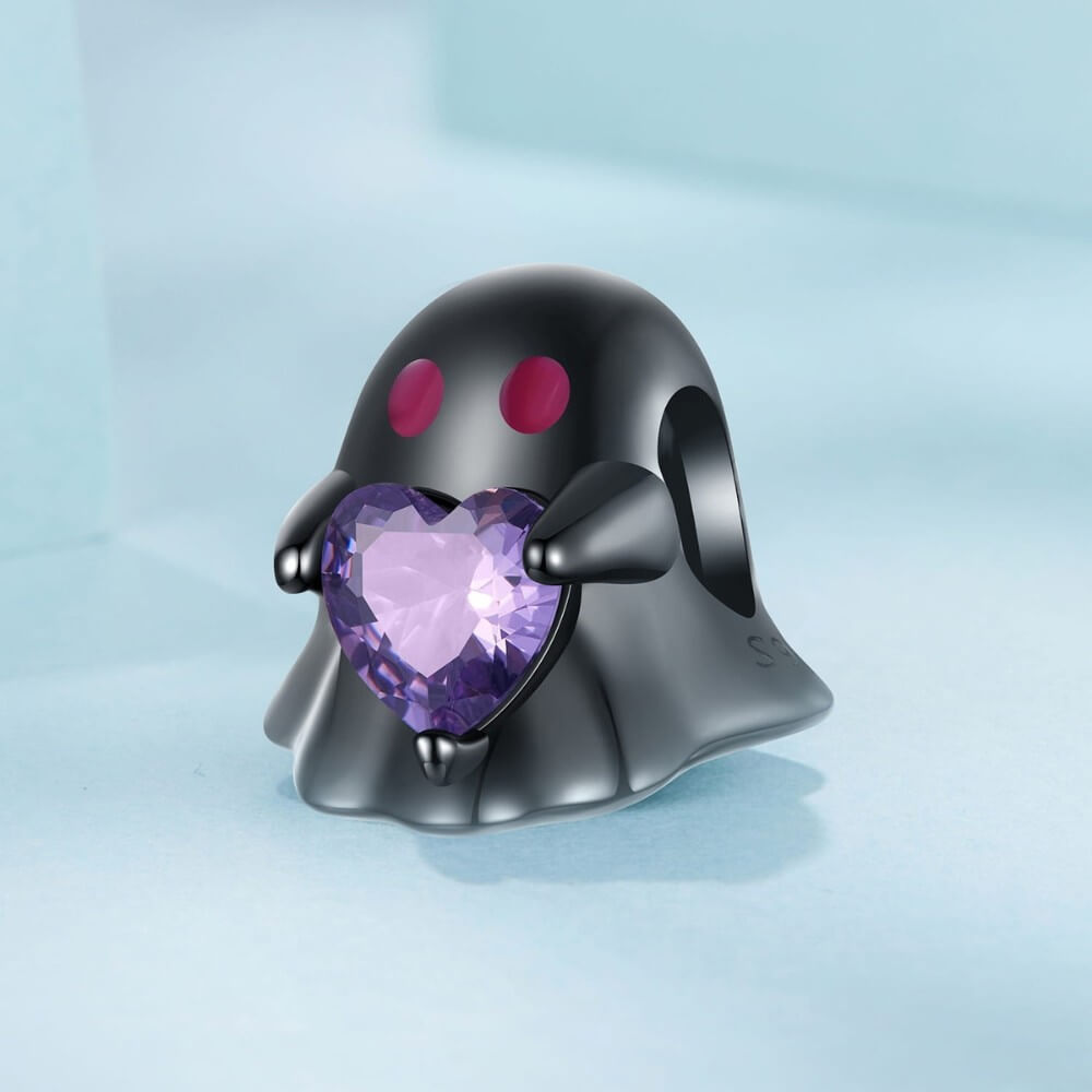Black ghost charm holding purple heart crystal in sterling silver style.