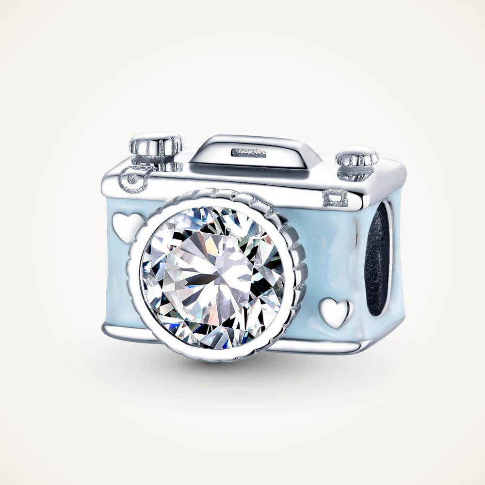 Sterling silver camera charm with blue enamel, heart details, and crystal lens - ORÉYA