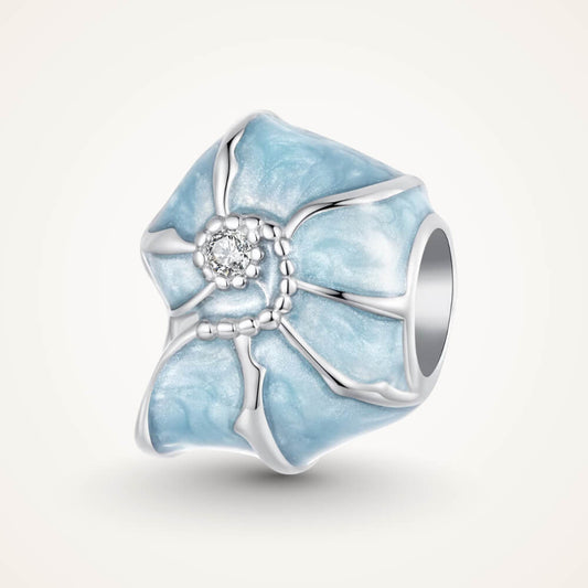 Sterling silver bead charm with blue enamel shell design and central clear gemstone - ORÉYA