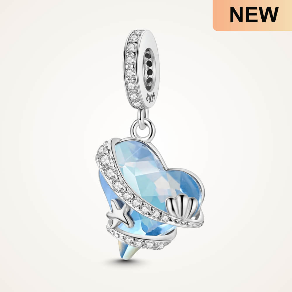 Sterling silver heart charm with blue faceted crystal and sea-themed details - ORÉYA