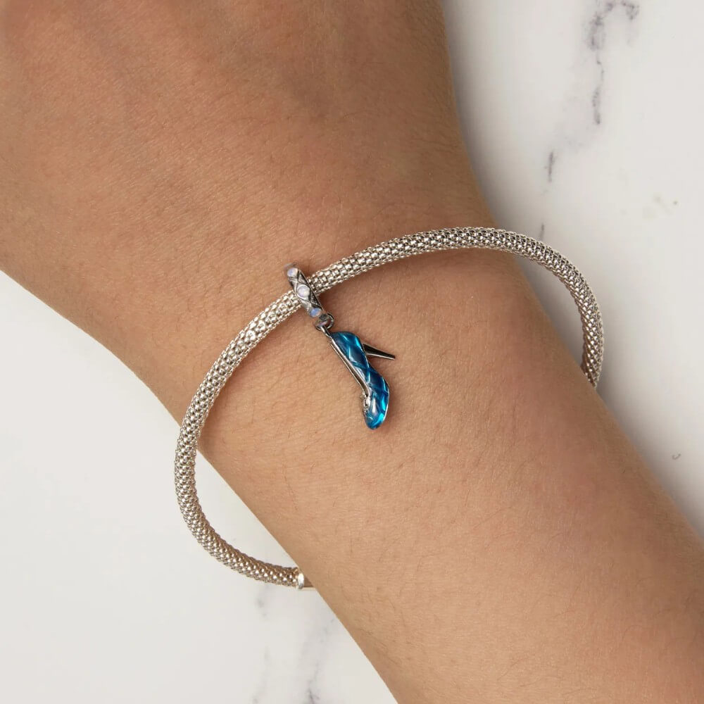 Sterling silver high heel charm with blue enamel and crystal accents.
