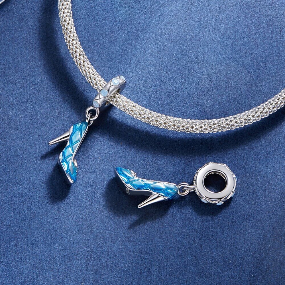 Sterling silver high heel charm with blue enamel and crystal accents.