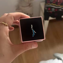 Sterling silver high heel charm with blue enamel and crystal accents.