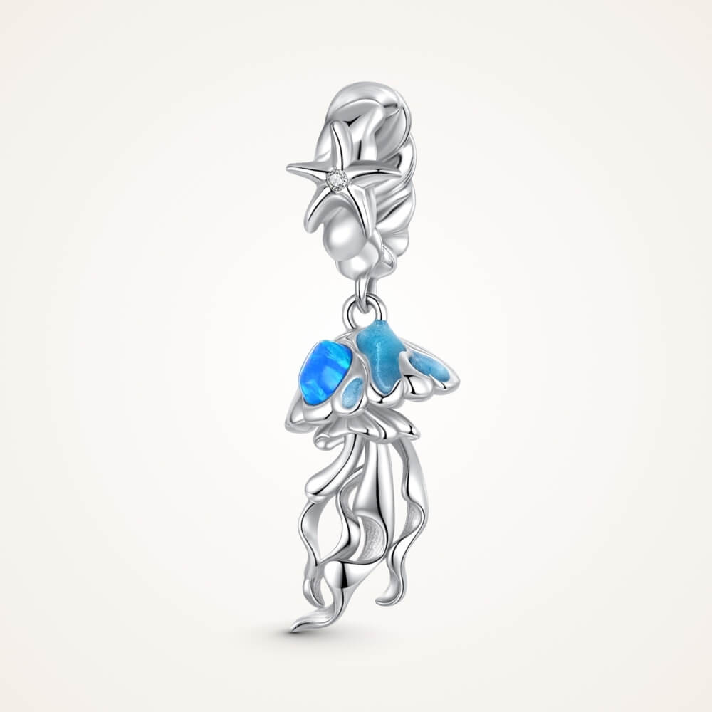 Sterling silver jellyfish charm with blue enamel and flowing ocean details - ORÉYA