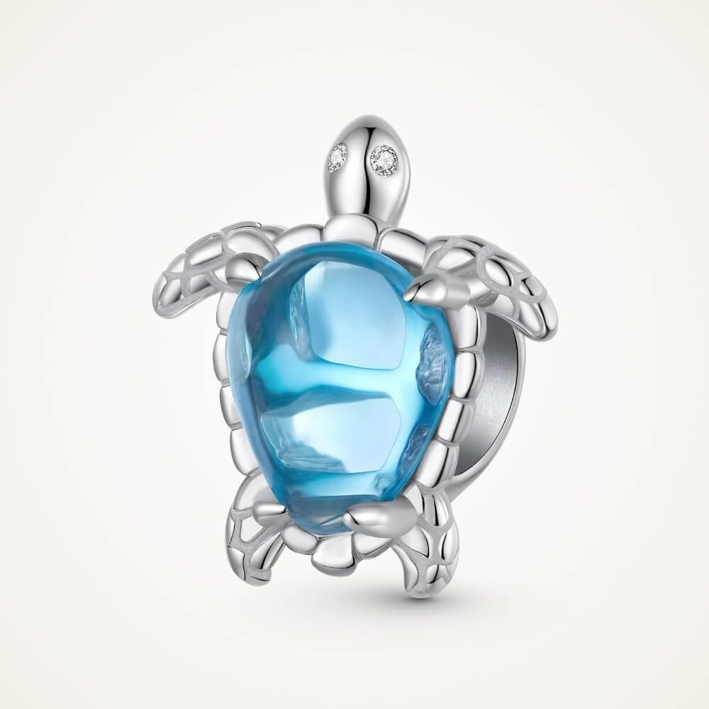 Sterling silver sea turtle charm with blue crystal shell and detailed flippers - ORÉYA