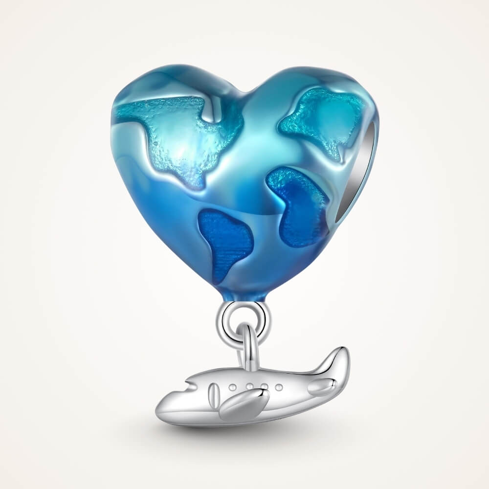 Blue heart travel charm with world map design and silver airplane dangle - ORÉYA