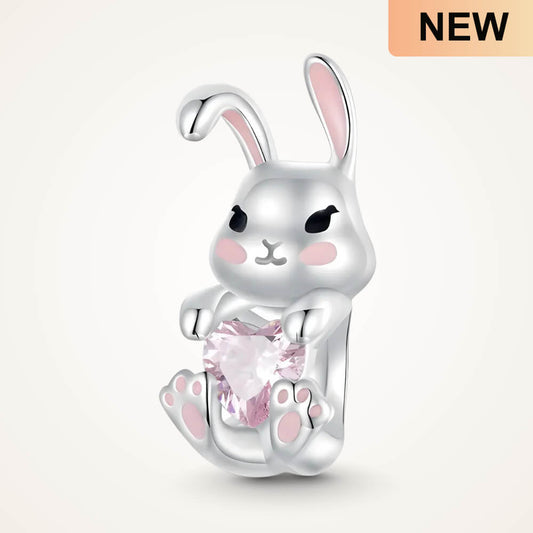 Sterling silver bunny charm with pink enamel accents and pink heart-shaped crystal – ORÉYA