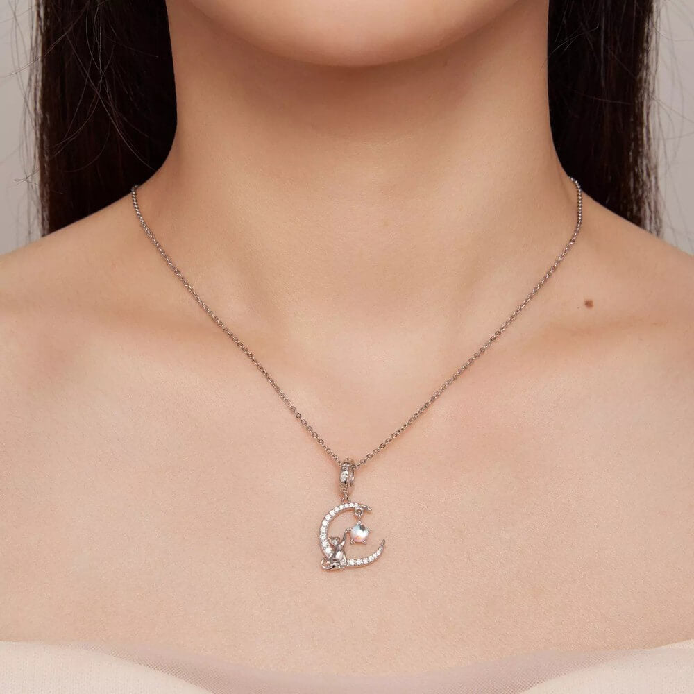 Sterling silver cat moon charm with star and opal crystal.