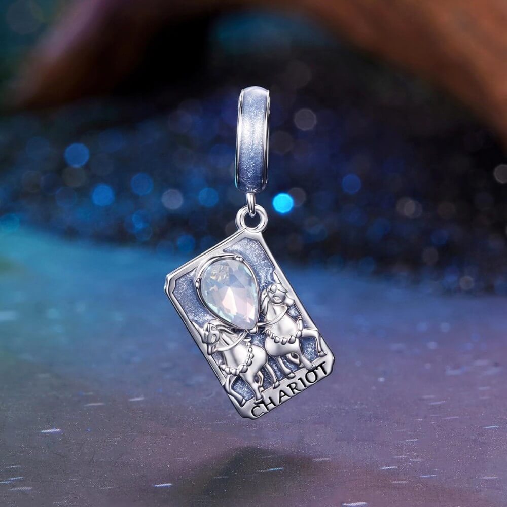 Sterling silver tarot card charm with horses, blue enamel, and opal crystal.
