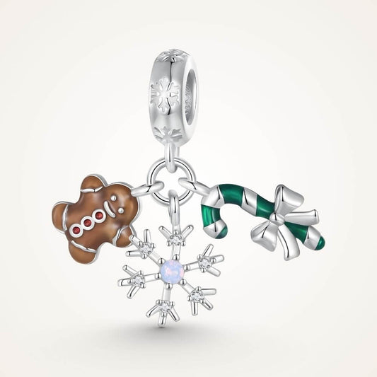 Sterling silver Christmas charm with gingerbread man, candy cane, bow, snowflake, and sparkling crystal details - ORÉYA