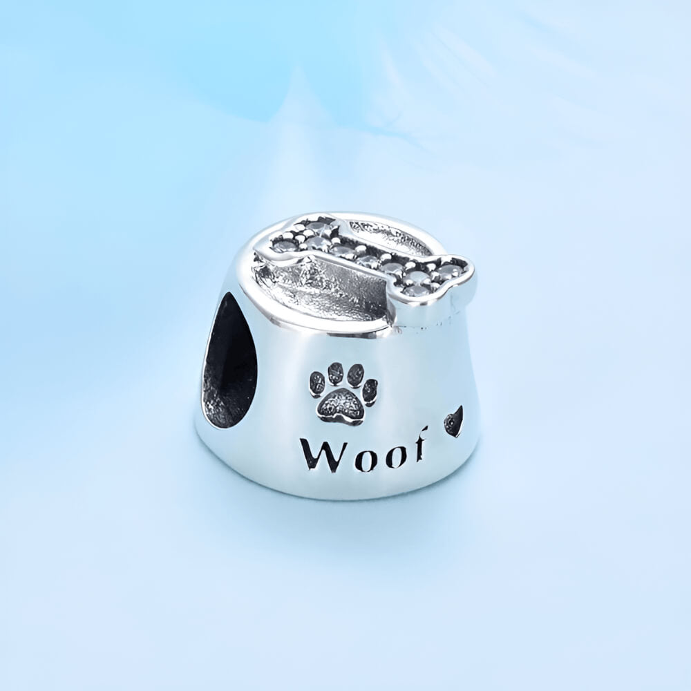 Sterling silver dog bowl charm with paw print and bone detail