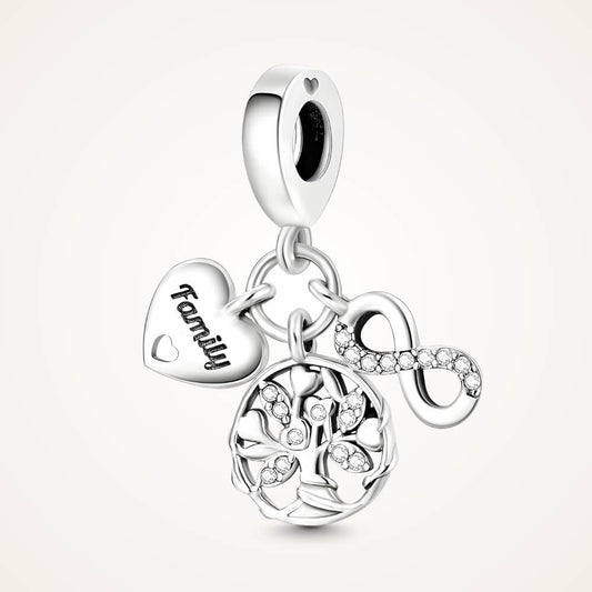 Sterling silver charm with ‘Family’ heart tag, crystal infinity symbol, and crystal tree of life – ORÉYA