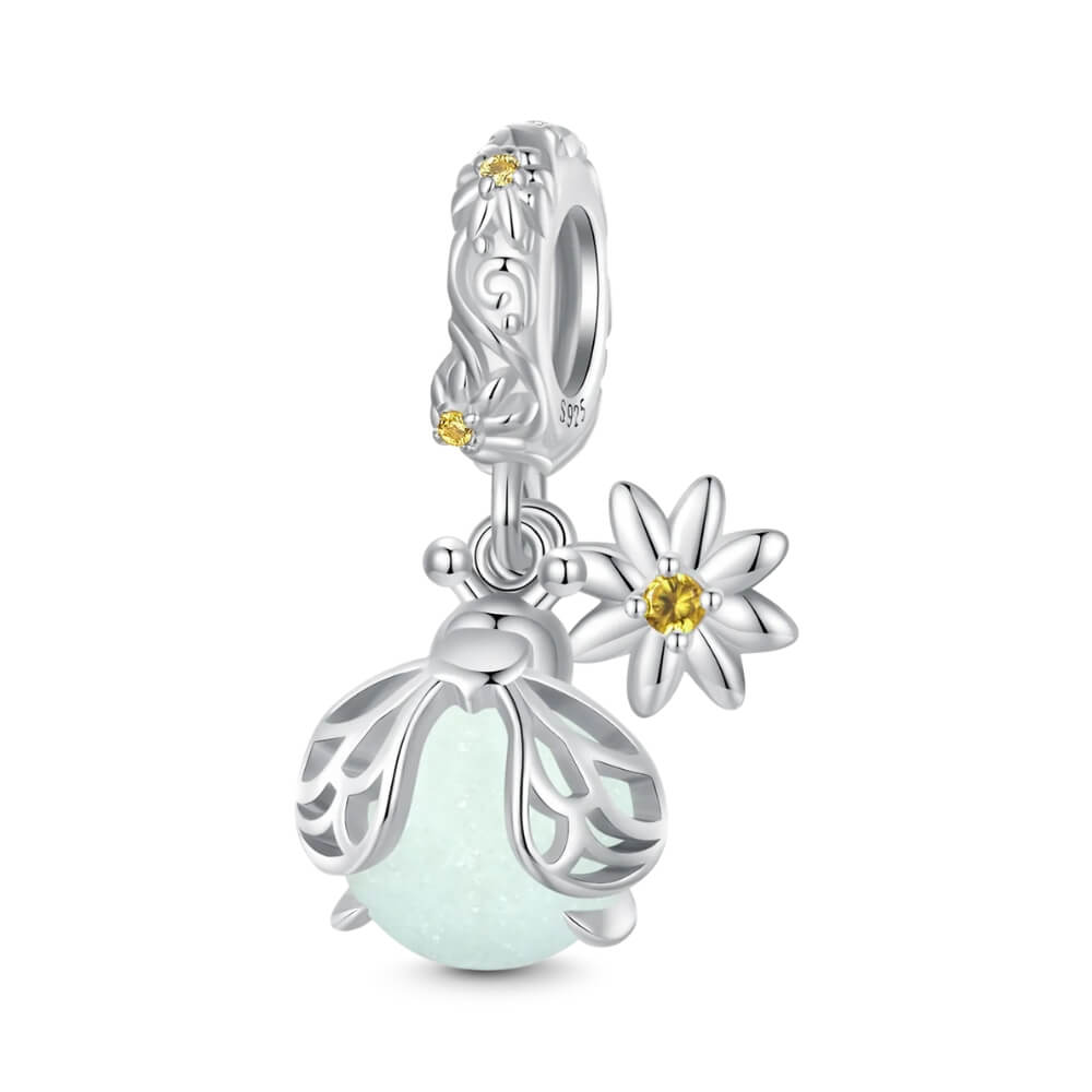 Sterling silver firefly charm with mint glowing enamel body and yellow flower detail - ORÉYA
