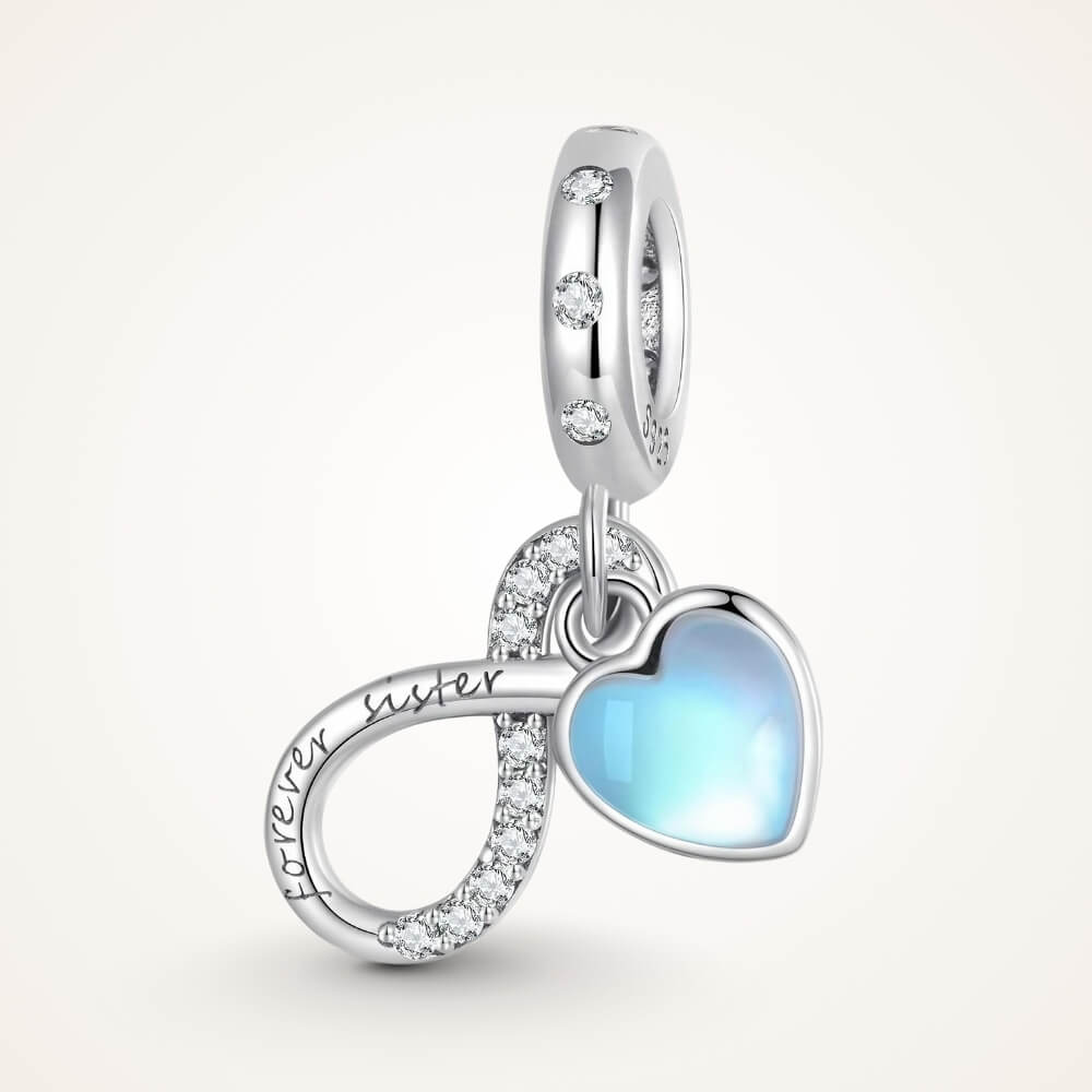 Sterling silver forever sister charm with blue heart and crystal infinity detail - ORÉYA