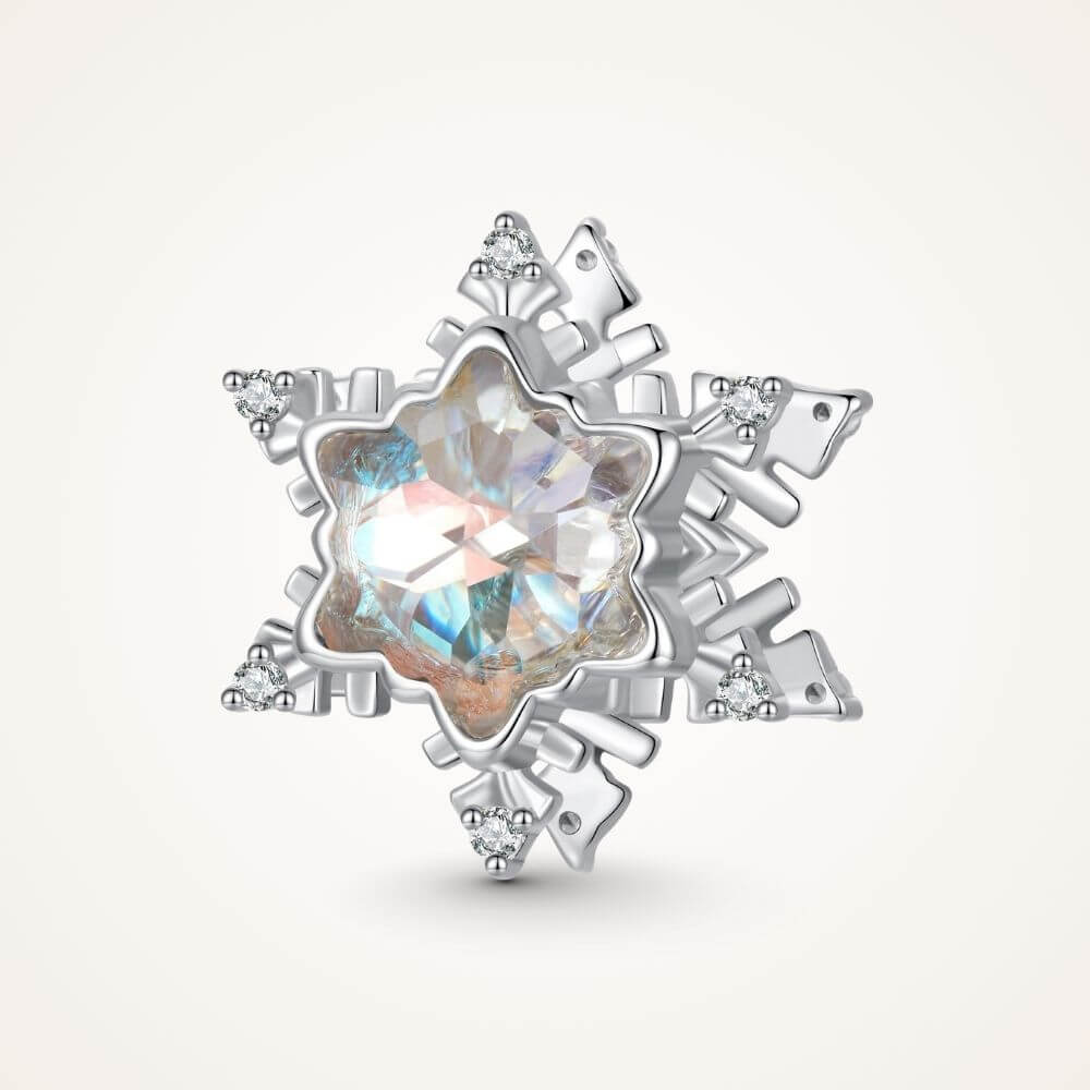 Sterling silver snowflake charm with iridescent crystal center and sparkling clear crystal accents - ORÉYA