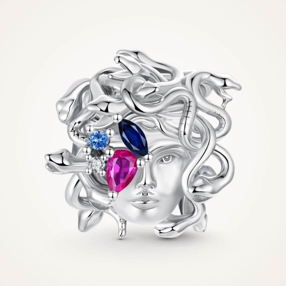 Sterling silver Medusa charm with sculpted snake hair and vivid pink, blue, and clear crystal details - ORÉYA