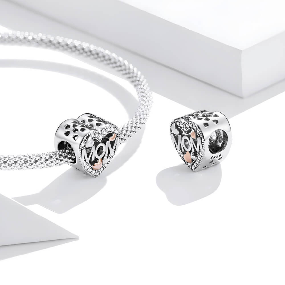 Sterling silver heart-shaped MOM charm with pavé crystals and mixed-metal rose gold and silver hearts