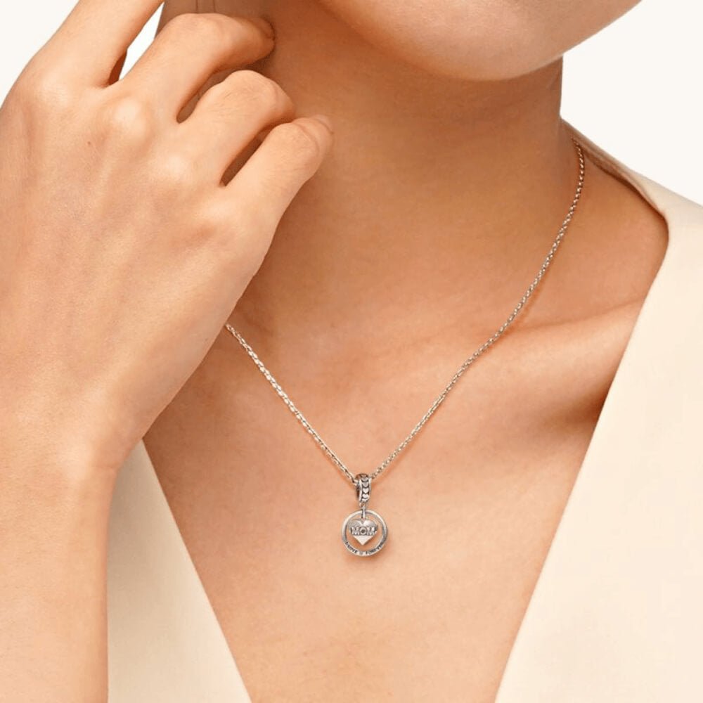 Sterling silver MOM heart charm with circular pendant engraved ‘I Love U Forever’ and heart details 