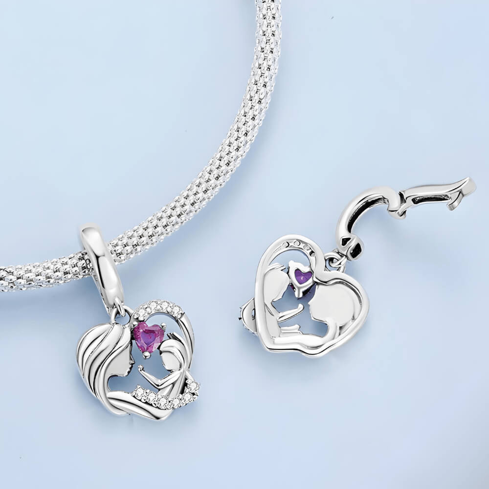 Sterling silver mother and child heart charm with pink heart gemstone and crystal accents 