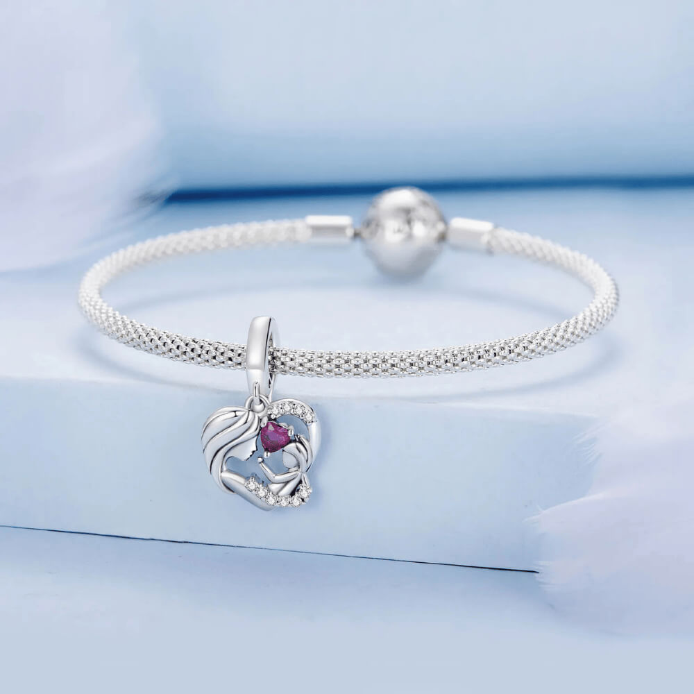 Sterling silver mother and child heart charm with pink heart gemstone and crystal accents