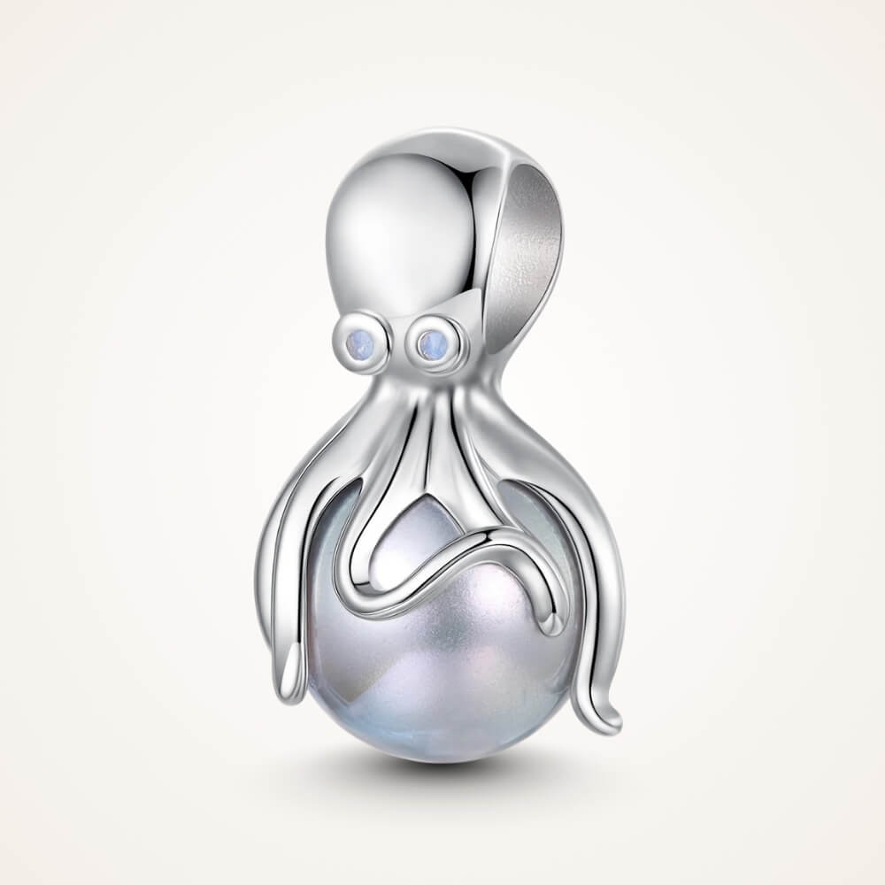 Sterling silver octopus charm holding iridescent pearl sphere - ORÉYA