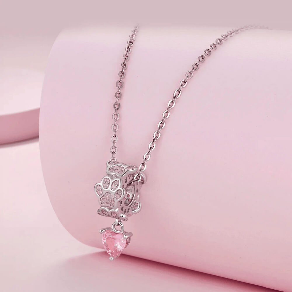 Sterling silver paw-print charm with opal stones and pink heart dangle 