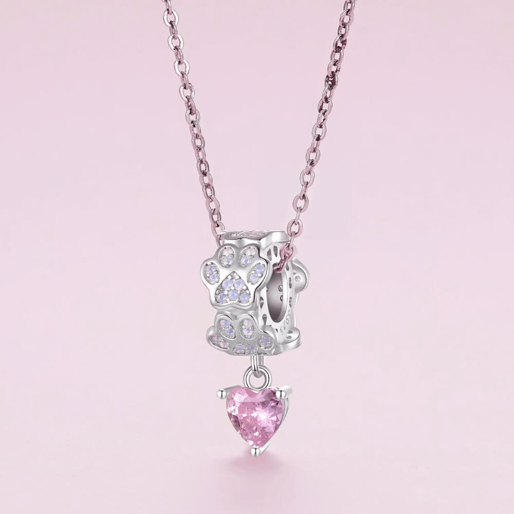Sterling silver paw-print charm with opal stones and pink heart dangle 