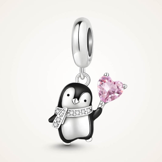 Sterling silver penguin charm holding pink heart crystal - ORÉYA