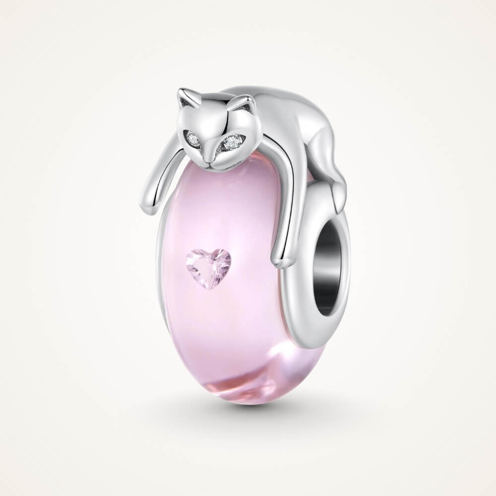 Sterling silver cat charm with pink crystal body and heart detail - ORÉYA