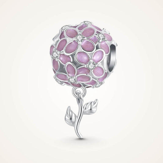 Sterling silver charm with pink enamel flowers, crystal flower centers, and a dangling silver leaf stem – ORÉYA.