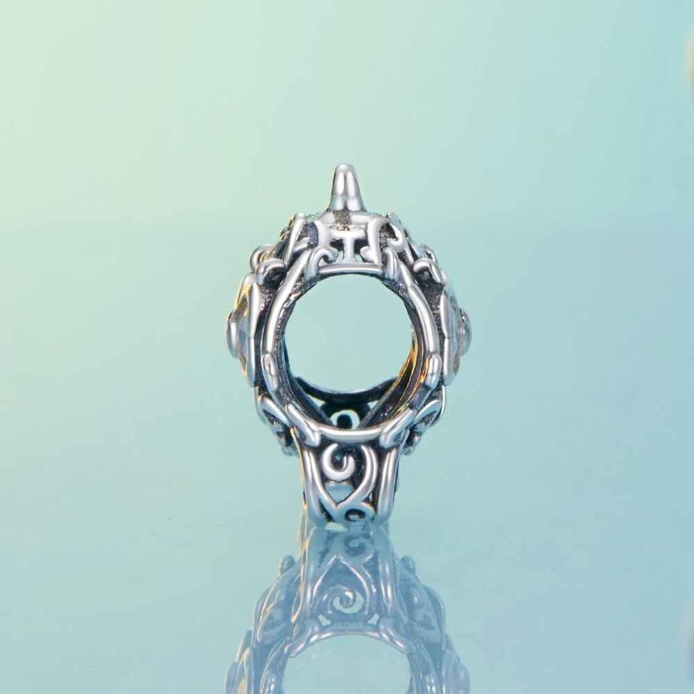 Sterling silver pumpkin carriage charm with heart-shaped crystals.