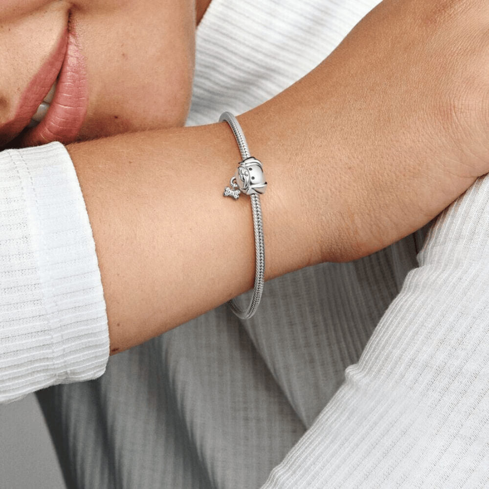 Sterling silver puppy head charm with dangling crystal bone