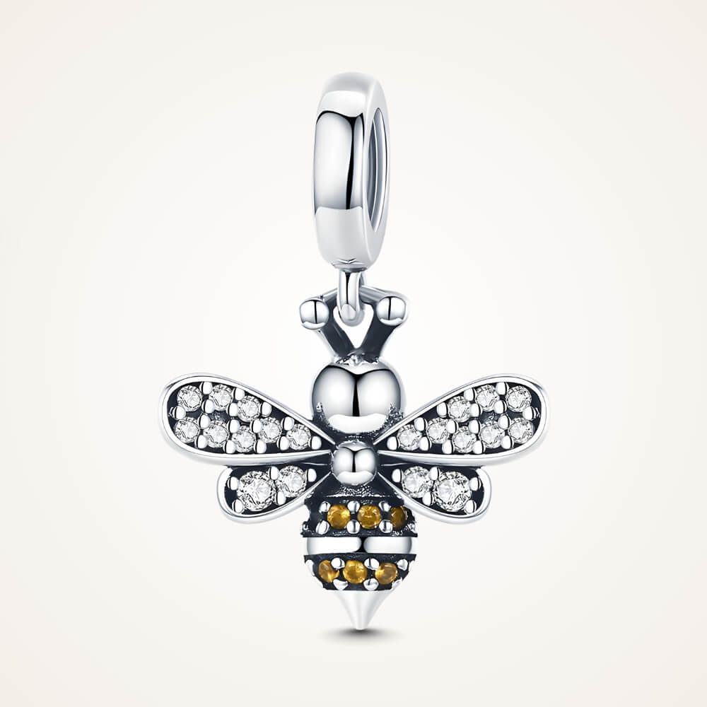 Sterling silver bee charm with crystal-paved wings and orange gemstone stripes – ORÉYA.
