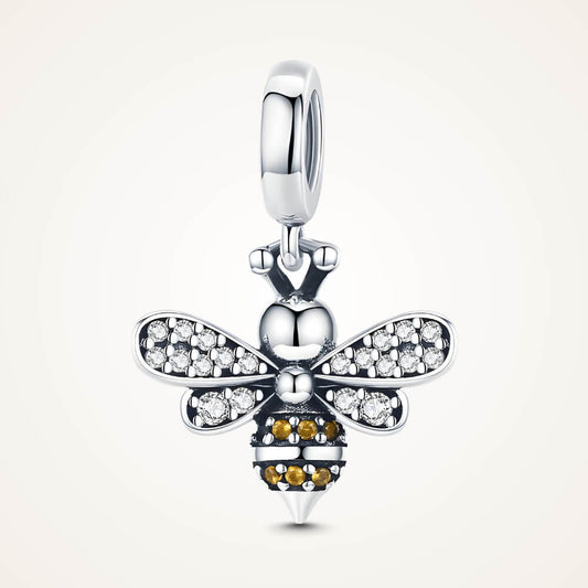 Sterling silver bee charm with crystal-paved wings and orange gemstone stripes – ORÉYA.