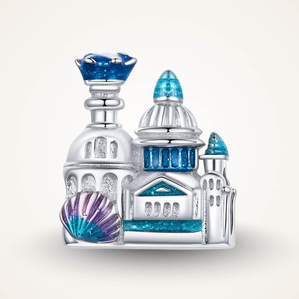 Sterling silver castle charm with blue enamel domes, glitter details, and shell accent - ORÉYA