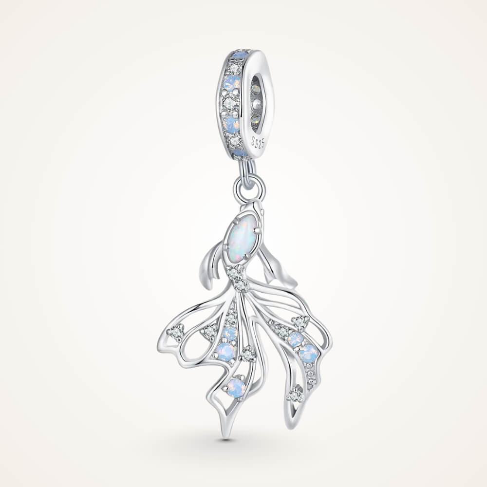 Sterling silver fish charm with opal-like stone and blue gemstone accents - ORÉYA