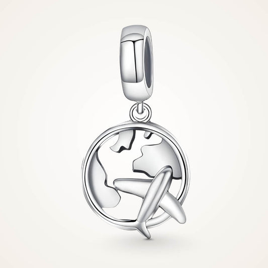 Sterling silver charm with a globe outline and a small airplane dangle in front – ORÉYA