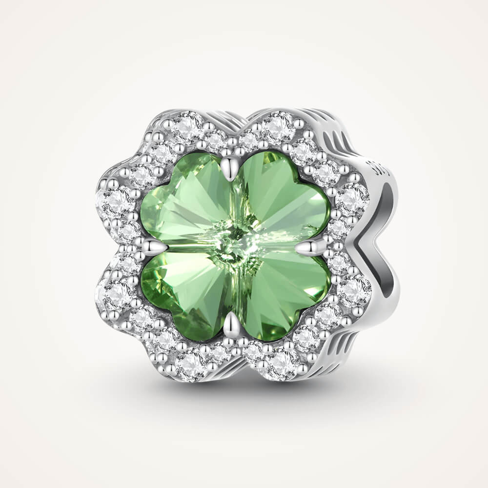 Sterling silver charm with a large green four-petal faceted stone framed by clear crystals – ORÉYA.