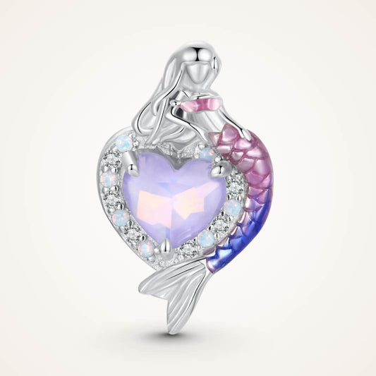 Sterling silver mermaid charm with a purple heart-shaped stone, crystal halo, and a gradient pink-to-blue enamel tail – ORÉYA