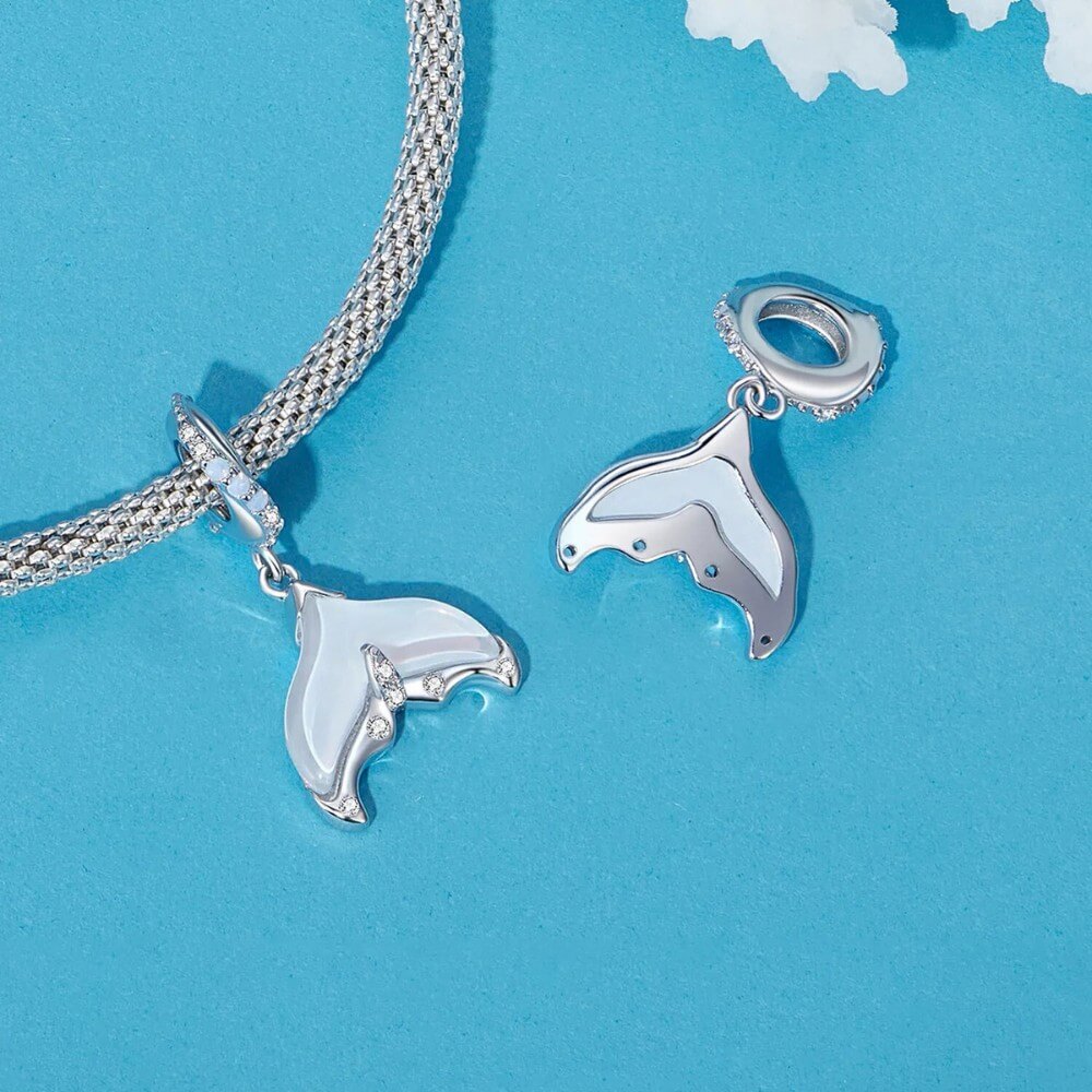 Sterling silver siren tail charm with iridescent enamel and crystals.