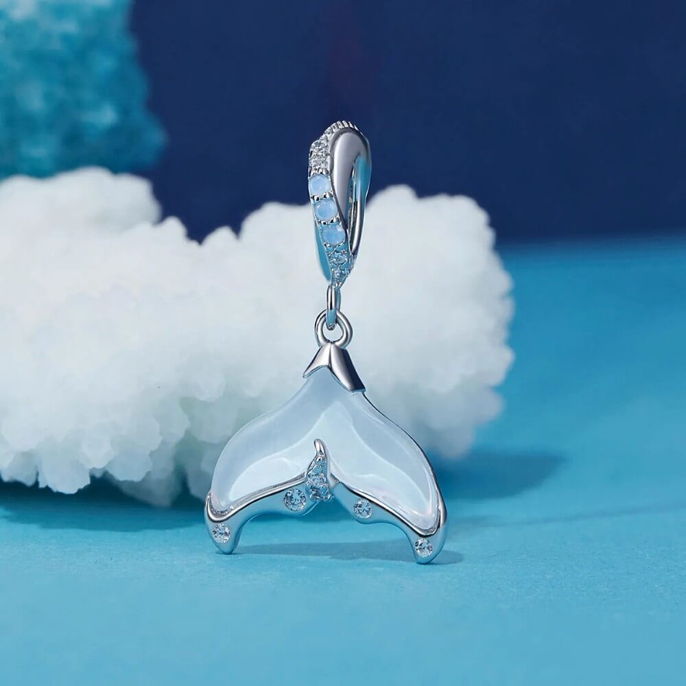 Sterling silver siren tail charm with iridescent enamel and crystals.