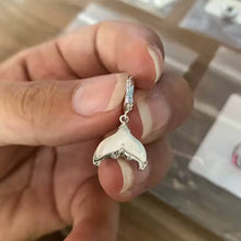 Sterling silver siren tail charm with iridescent enamel and crystals.