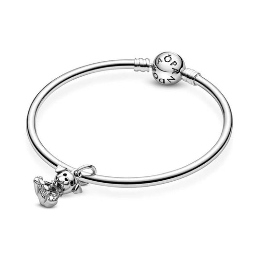 Sterling silver sitting puppy charm with dangling bone detail