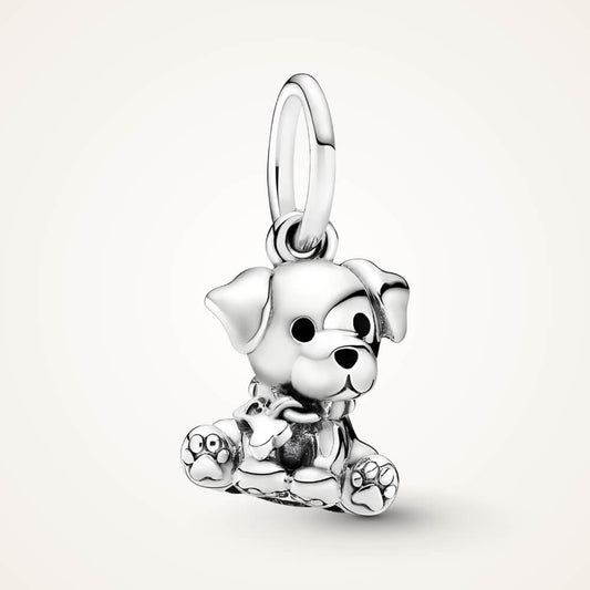 Sterling silver sitting puppy charm with dangling bone detail – ORÉYA