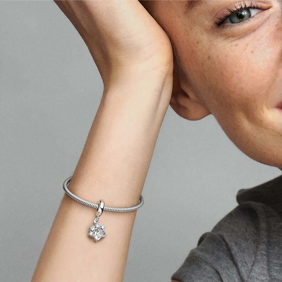 Sterling silver paw-print charm with sparkling clear zircon stones 